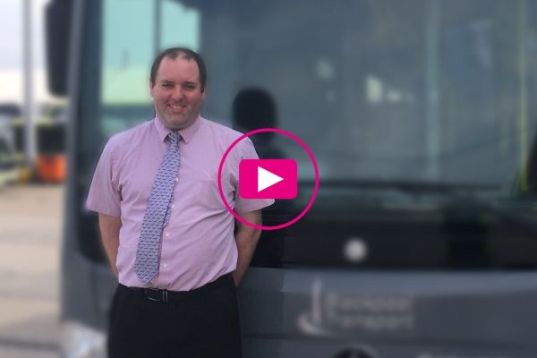 Simon Harris in front of a Blackpool Transport bus